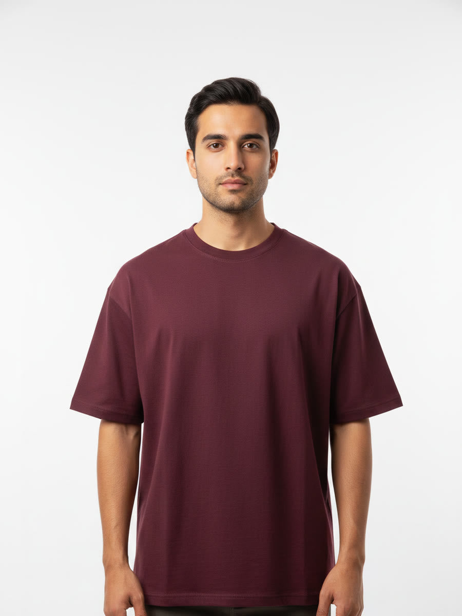 Foldinn drop shoulder tee in Maroon, worn by a model